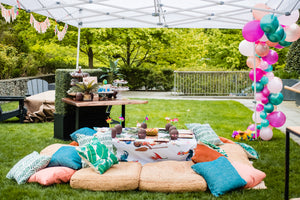 Outdoor kid's Birthday party with custom printed tablecloth and decorations