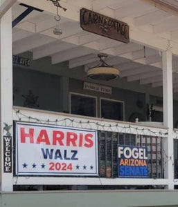 Harris for president banner hanging on a porch