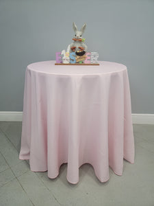 White Elegant tablecloth with Easter Bunny statue on top