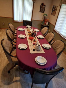 Large oval tablecloth decorated for the fall