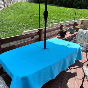 Outdoor Tablecloth with umbrella hole in a patio setting