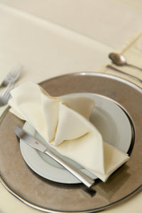 Ivory Havana napkin standing in a clamshell form