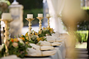 Wedding linens on large table with candalabria