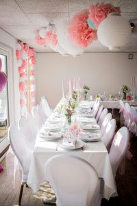 White table linens with matching napkins at an intimate wedding