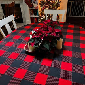 black and red plaid tablecloth over a table