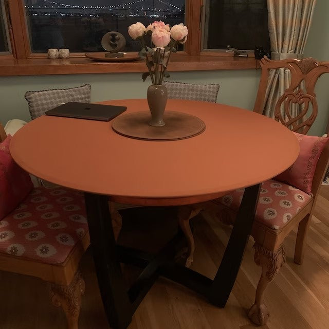 Round table best sale with fitted chairs