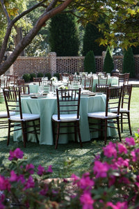 120 Round Tablecloth in Classy outdoor reception setting with white tablecloths