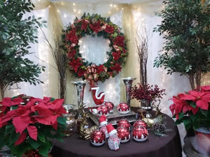 Christmas photo set with red tablecloth and ornaments