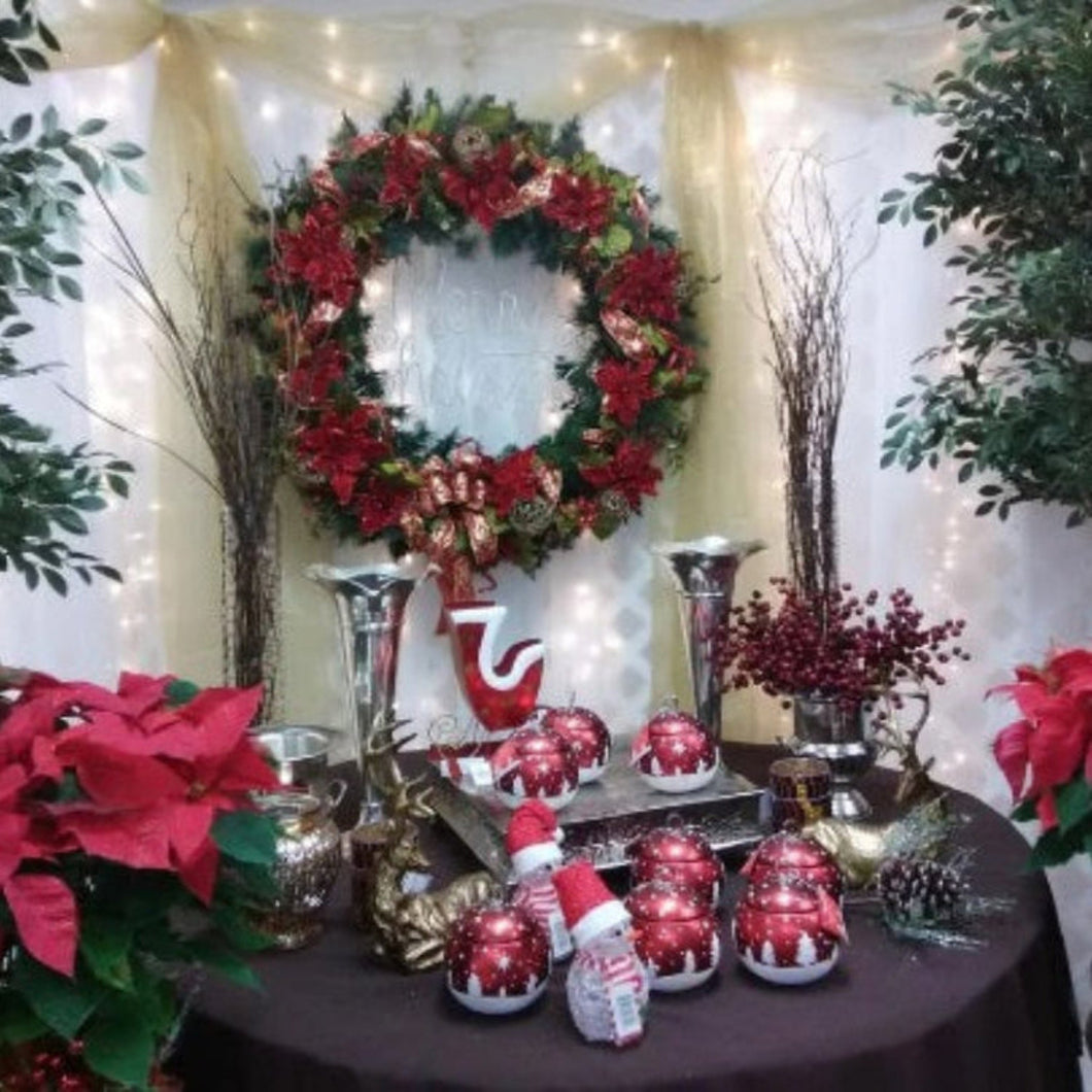 Christmas photo set with red tablecloth and ornaments