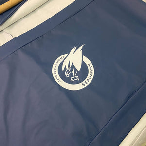 Rectangular printed vinyl tablecloth with white logo for the Cape Cod Academy