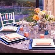 Exquisite table linens with place settings at a wedding