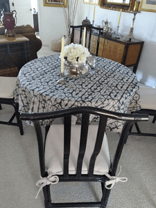 Round shibori tablecloth in a dining room