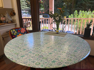 wipe clean round fitted tablecloth on the porch in a farmhouse