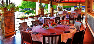 Patio Reception with excellent table linen on round tables