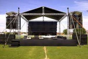 Black stage skirt at an outdoor concert