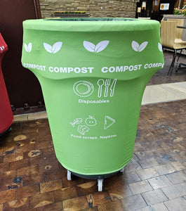 Green custom-printed compost trash can cover in a restaurant setting