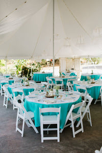 Fantastic looking table linen set up outdoor under a tent