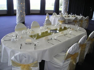 Large oval tablecloths at a wedding reception