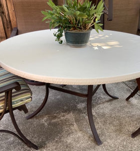 white vinyl tablecloth with felt backing on a patio