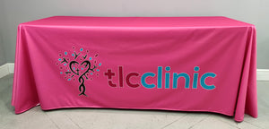 6-foot custom printed pink tablecloth with front panel print for the TLC Clinic