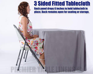 Image of a woman sitting at a table with 3-sided fitted liquid repellent table cloth with text above