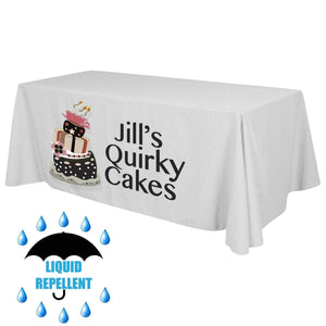 Mock-up of a grey liquid Repellent table cover with front panel print for Jill's Quirky Cakes