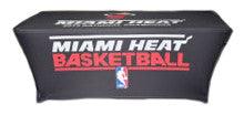 Custom branded 8 foot table cover with Miami Heat logo at center and top