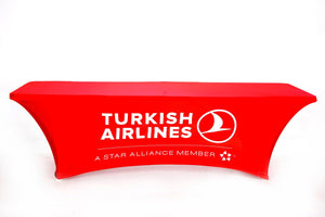 Red Spandex tablecloth with Turkish Airlines logo in the center