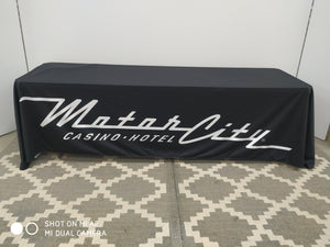 Fitted table throw with Motor City Casino logo featured