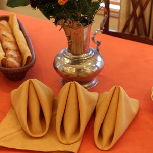Havana Napkins on a table with a bread basket and flowers