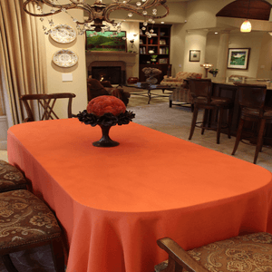 Fall tablecloth, orange oval tablecloth in the Haana Linen Collection