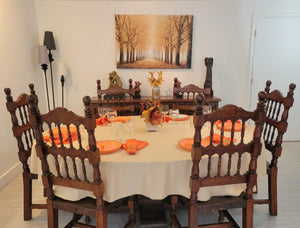 Majestic Oval Tablecloth set for the fall with orange napkins