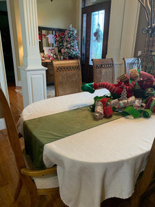 Christmas oval tablecloth with beautiful holiday decoration 