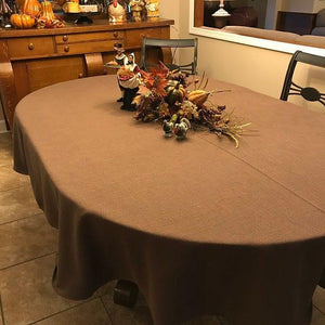 Oval Thanksgiving tablecloth, chocolate with decor. 