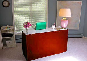 Red skirt on a work desk in a home office