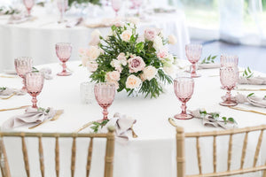 white wedding tablecloth setting at wedding venue