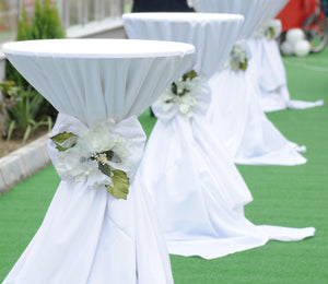 Cocktail tablecloths with sashes for a wedding