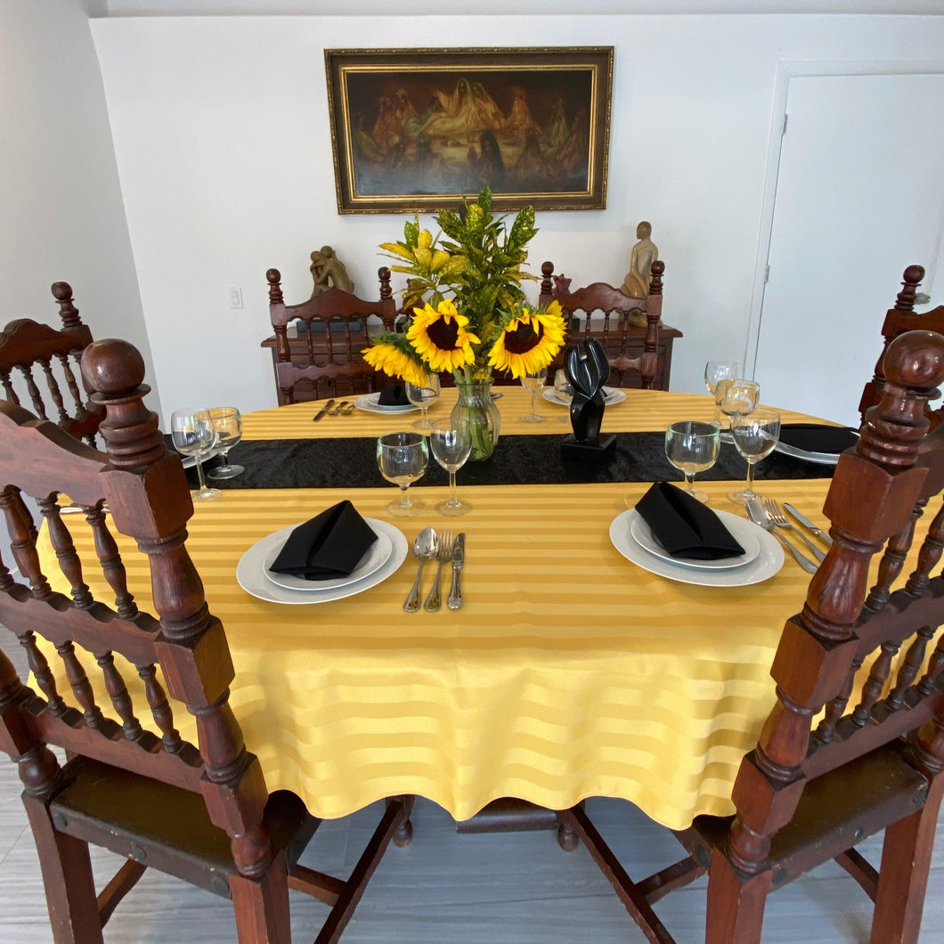 Poly Stripe Oval Table line with black dinner napkins