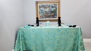 Damask tablecloth on a rectangular table 