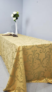 Gold damask tablecloth on a rectangular table
