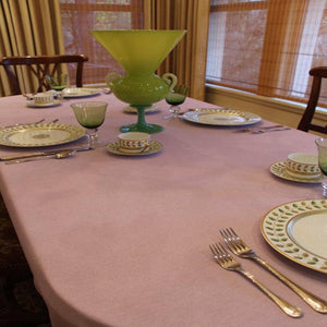  Havana linens on a family dinner table with plates by windows