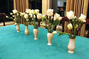  Havana table Linens on a rectangular table with flower vases and tulips in a home dining room 
