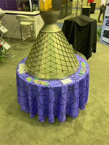 Custom printed round table cloth at a convention center