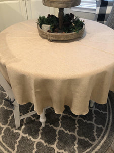 Round Tablecloth in Ivory with a wooden centerpiece in a home kitchen setting