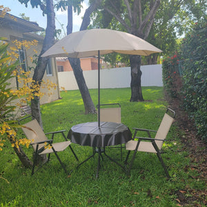 Vinyl tablecloth with umbrella hole in a beuatiful outdoor garden