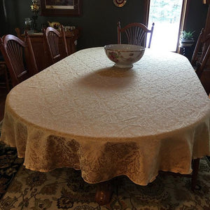 Saxony damask table cloth on an oval table