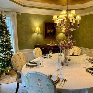 Oval tablecloth, damask table linen during Christmas holiday