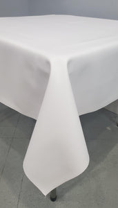 closeup of a square white vinyl tablecloth 