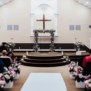 White Velvet Aisle runner in white inside a church wedding ceremony leading to the altar